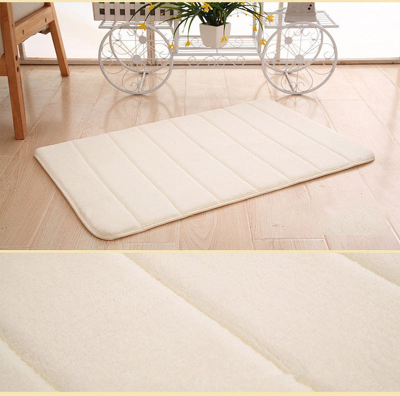 Khaki coloured door mat.