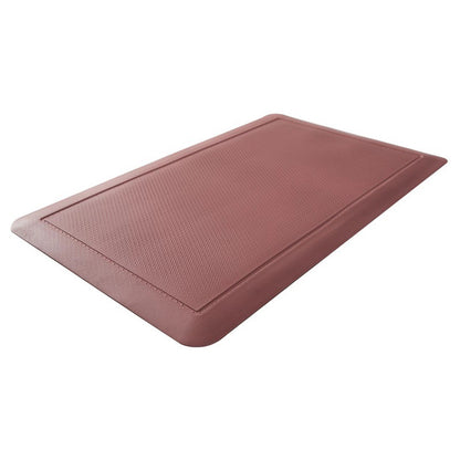 A red rubber comfort mat on a white background