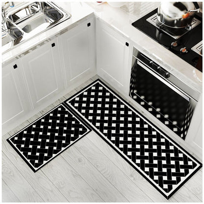 Set of stylish black and white cross coloured runner rug and small floor mat.