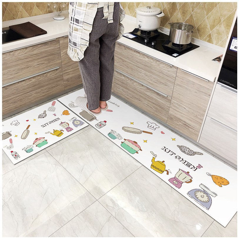 Woman standing on white coloured floor comfort mat printed as warm kitchen.