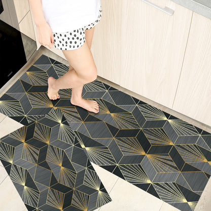 Woman standing on rectangle shaped absorbent kitchen floor mats with different coloured grids printed on it.