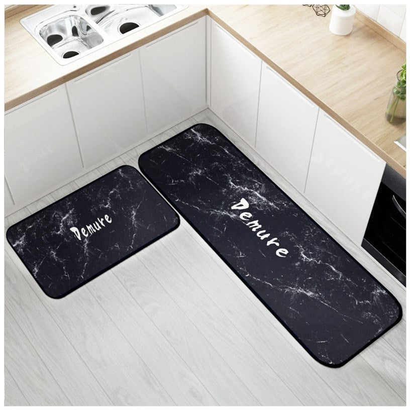 Simple black coloured set of runner rug and small floor mat.